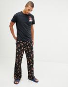 Asos Design Holidays Straight Leg Pyjama Bottoms In Leaping Reindeer Print - Black