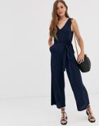 Asos Design V Front V Back Textured Sleeveless Jumpsuit With Tie Waist-navy