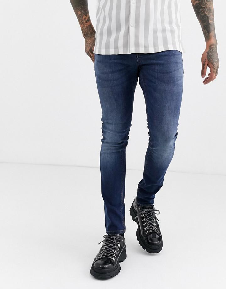 Asos Design Super Skinny Jeans In Dark Wash-blue