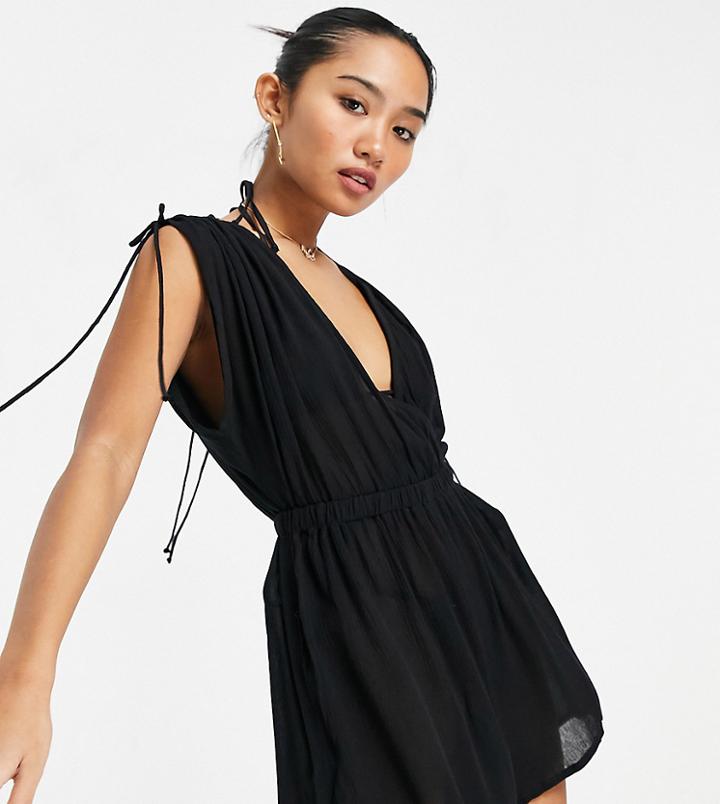 Asos Design Petite Crinkle Gathered Plunge Beach Romper In Black