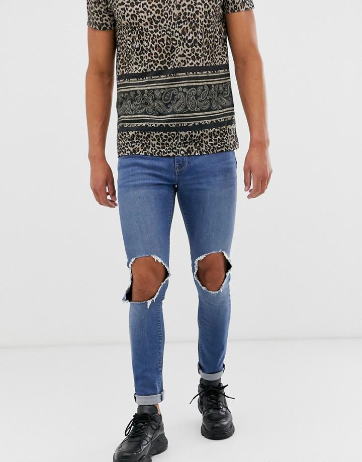 Asos Design Super Skinny Jeans In Mid Wash Blue With Open Knee Rip