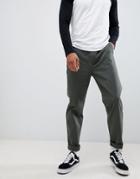 Asos Design Relaxed Chinos In Dark Green Wash With Turn Up