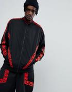 Asos X Star Wars Oversized Poly Tricot Track Jacket With Printed Tape - Black