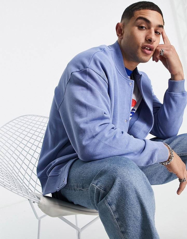 Asos Design Oversized Jersey Bomber Jacket In Blue Acid Wash-blues
