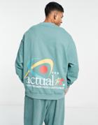 Asos Actual Oversized Sweatshirt With Running Graphic And Logo Prints In Green