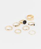 Asos Design 8 Pack Ring Set With Chain And Black Detail In Gold Tone