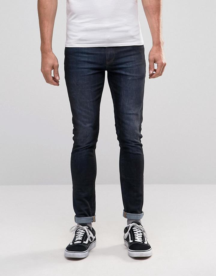 Asos Super Skinny Jeans In Coated Dark Wash - Blue