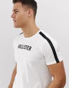 Hollister Chest Logo And Sleeve Taping T-shirt In White - White