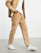 Carhartt Wip Newel Relaxed Tapered Jeans In Brown Stone Wash