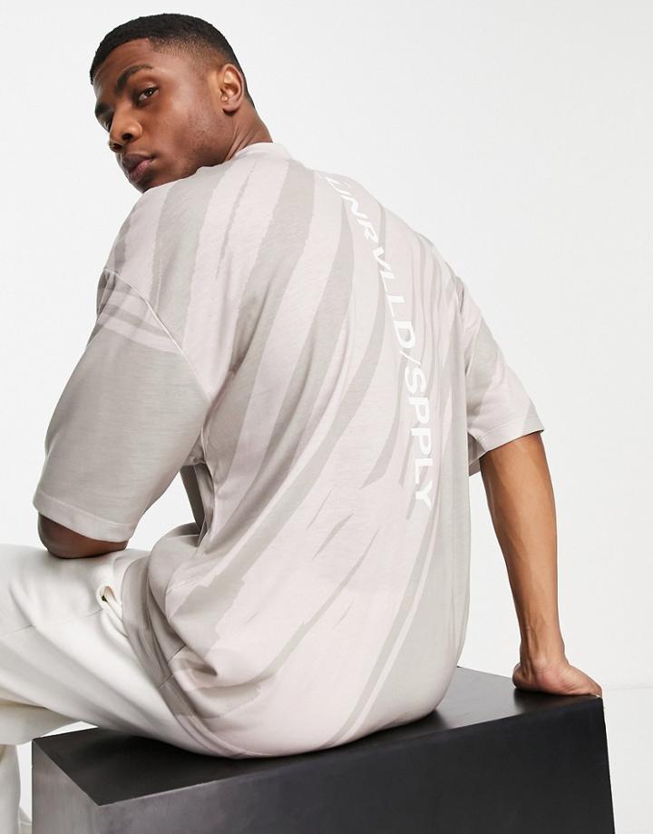 Asos Unrvlld Spply Oversized T-shirt With Diagonal Abstract Print In Neutral-brown
