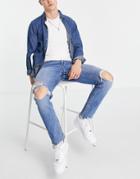 Asos Design Slim Jeans With Knee Rips And Raw Hem In Mid Wash Blue-blues