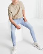 Asos Design Spray On Jeans With Power Stretch In 'less Thirsty' Light Wash With Rips-blues