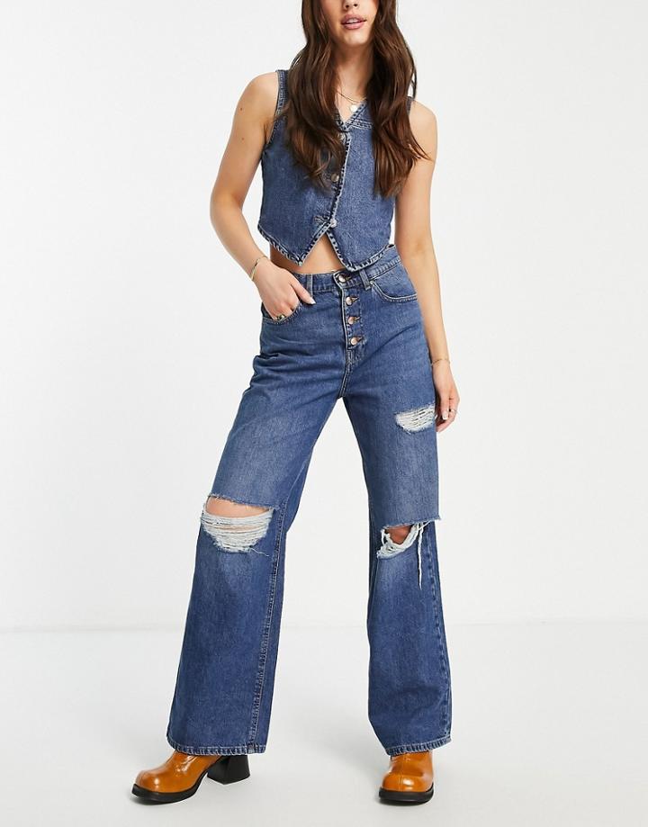 Only Hope Wide Leg Jeans With Exposed Buttons And Extreme Rips In Mid Blue Wash