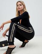 Prettylittlething Snake Side Stripe Joggers In Black - Black