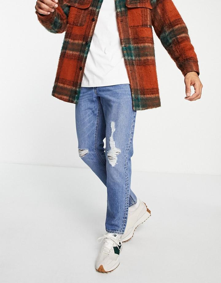 Asos Design Slim Jeans In Vintage Mid Wash With Knee Rips-blues