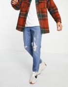 Asos Design Slim Jeans In Vintage Mid Wash With Knee Rips-blues