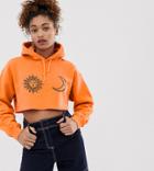 Reclaimed Vintage Inspired Cropped Overdye Hoodie In Orange With Sun And Moon Faces - Orange