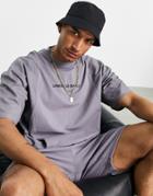 Asos Unrvlld Spply Coordinating Oversized T-shirt With Cut & Sew Nylon Panels And Chest Print In Black