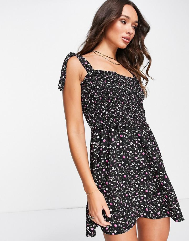 The Frolic Gia Shirred Mini Beach Dress In Black Floral-multi