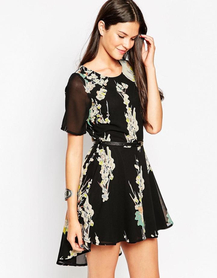 Yumi Belted Dip Back Skater Dress In Eastern Floral Print