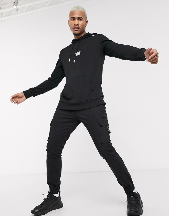 Puma Taped Arm Hoodie In Black