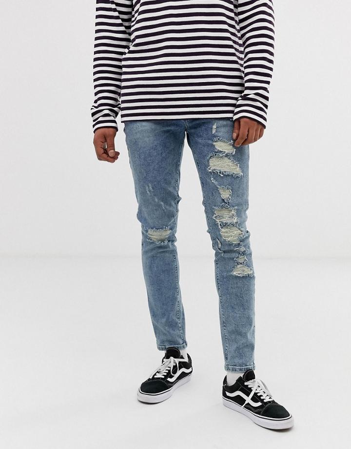 Asos Design Skinny Jeans With Mega Rips In Light Blue
