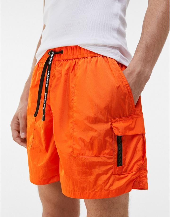 Bershka Swim Shorts With Cargo Pockets In Orange-black