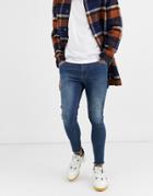 Asos Design Spray On Jeans In Power Stretch In Smokey Blue With Abrasions