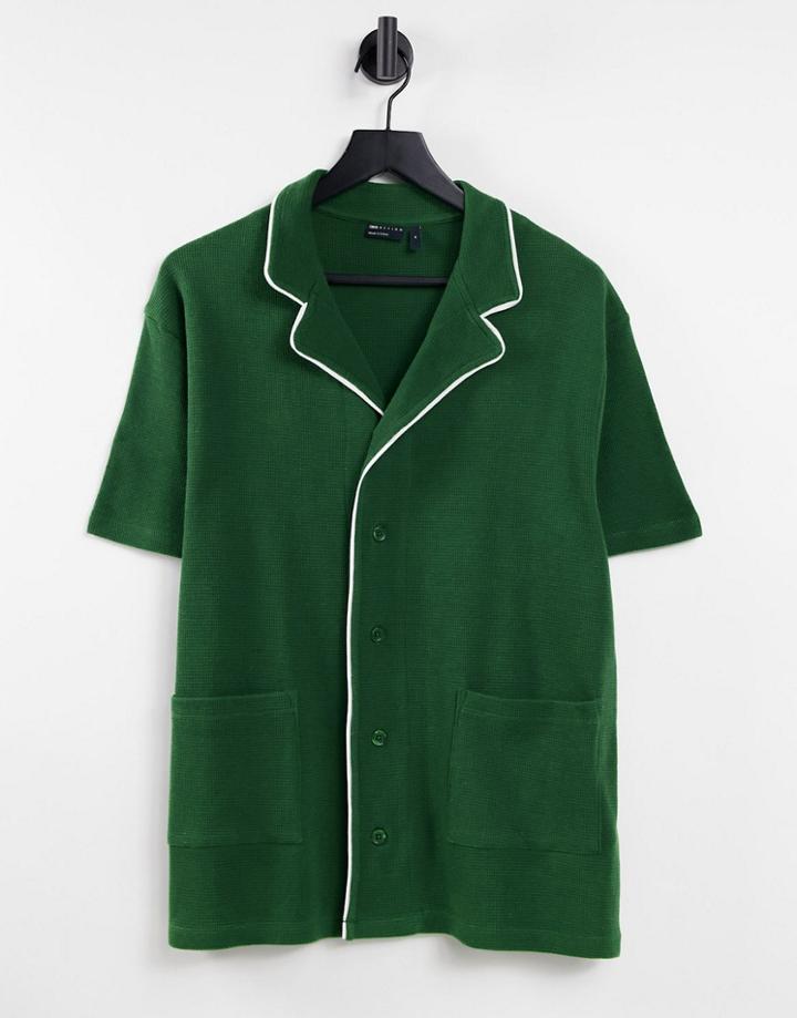 Asos Design Relaxed Waffle Polo With Pockets In Green With White Piping