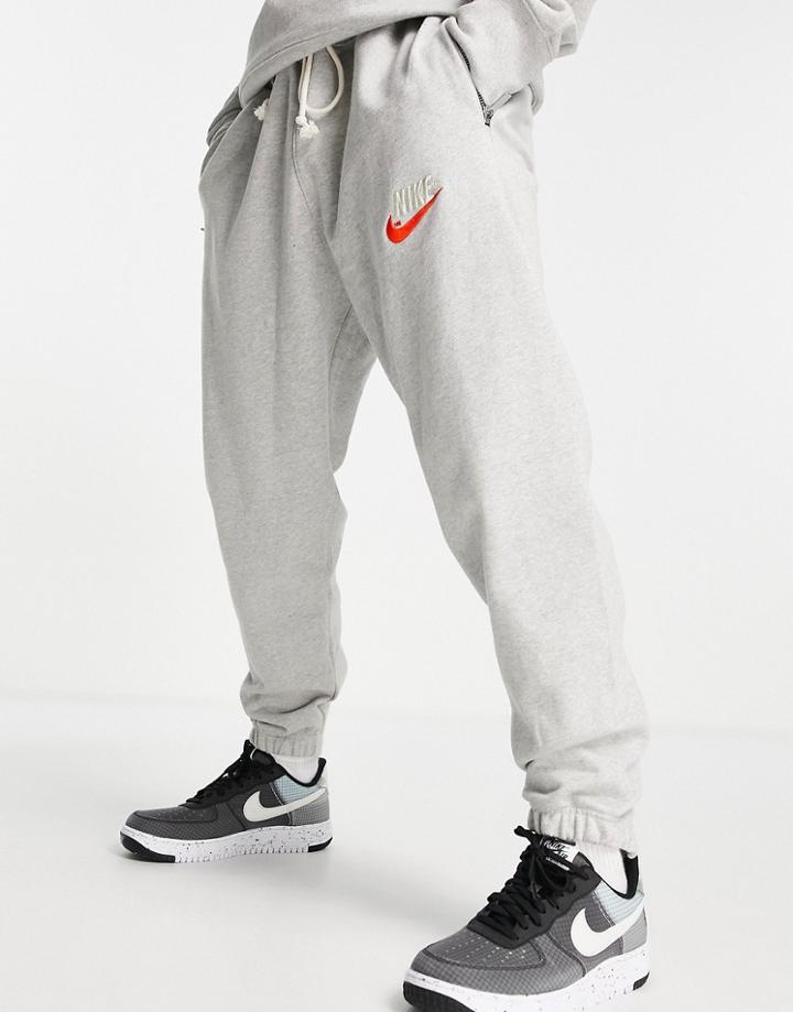 Nike Trend Fleece Zip Cuffed Retro Logo Sweatpants In Gray Heather