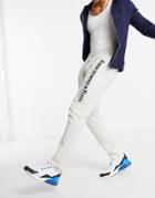 Abercrombie & Fitch Tech Embroidered Logo Cuffed Sweatpants In Heather Gray-grey