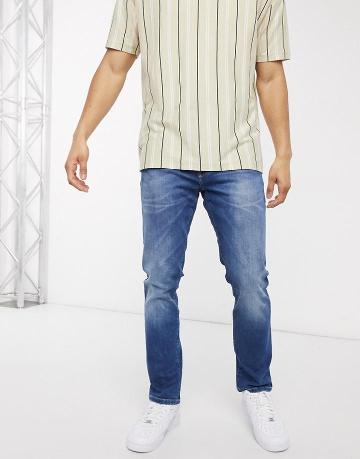 Wrangler Larston Slim Tapered Jeans In Blue-blues