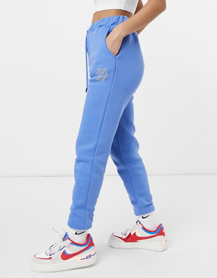 Criminal Damage Oversized Sweatpants With Rhinestone Embellished Logo In Blue-blues