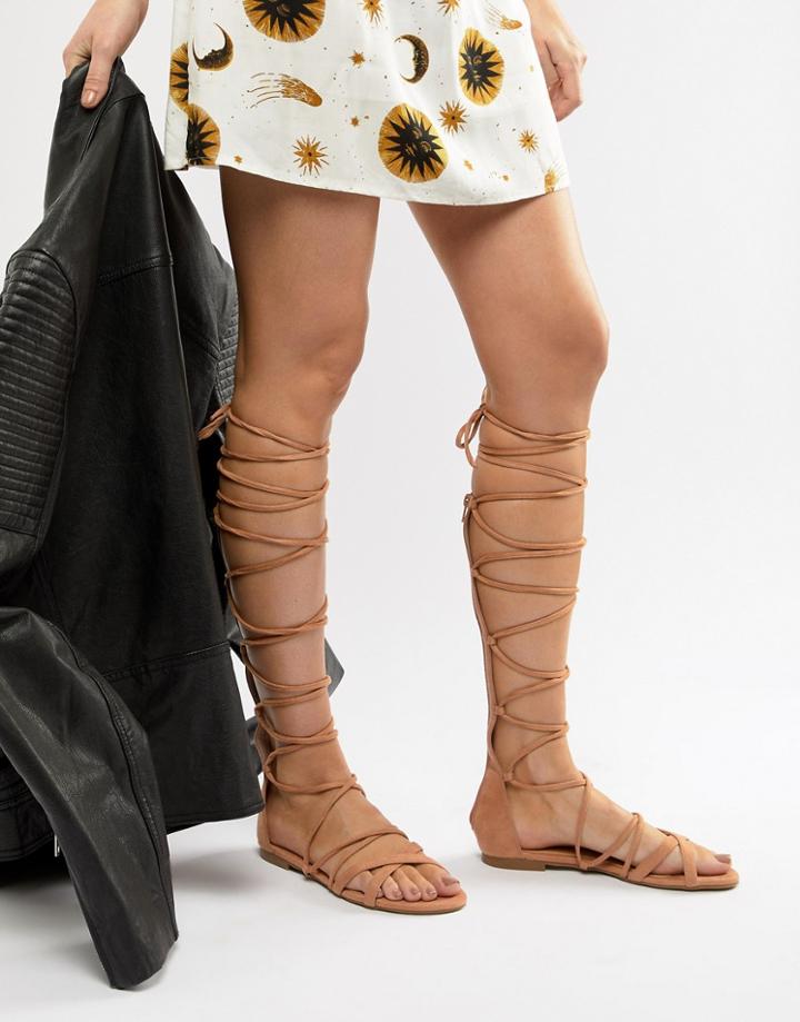 Raid Stone High Leg Gladiator Sandals - Beige
