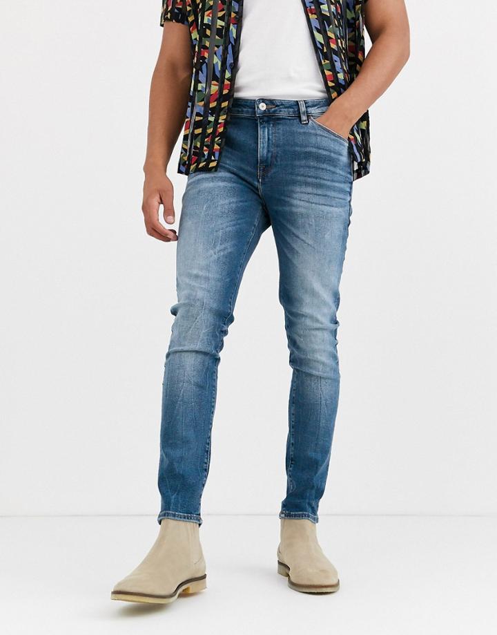 Asos Design 12.5oz Skinny Jeans In Vintage Mid Wash Blue