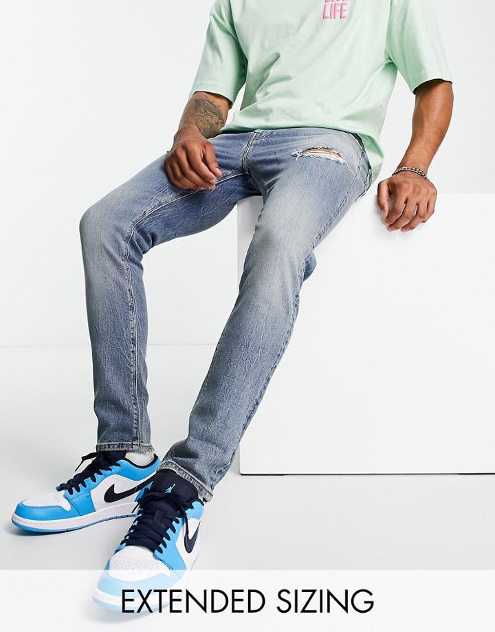 Asos Design Skinny Jean In Mid Wash With Rips-blue