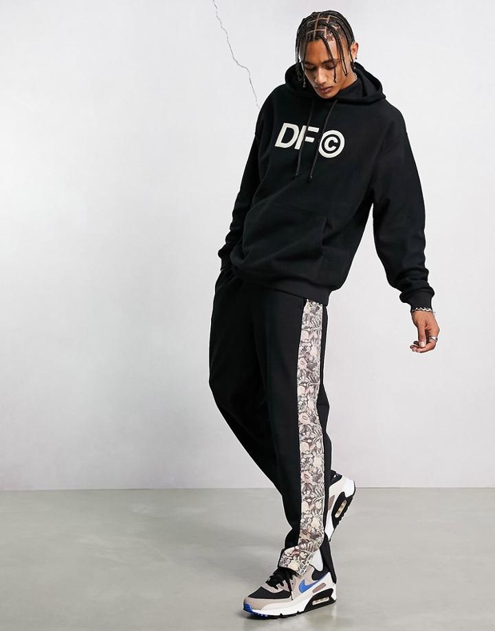 Asos Dark Future Relaxed Sweatpants With Printed Velour Side Panels In Black