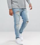 Asos Design Plus Skinny Jeans In Light Wash With Heavy Rips-blue
