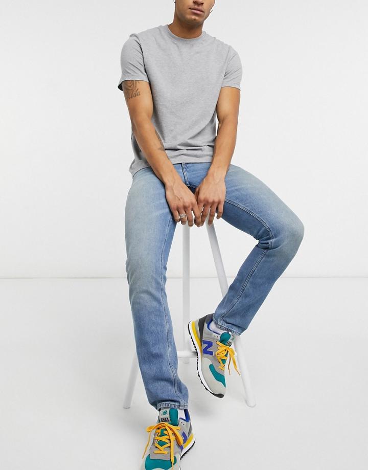 Asos Design Slim Jeans In Vintage Dirty Light Wash Blue