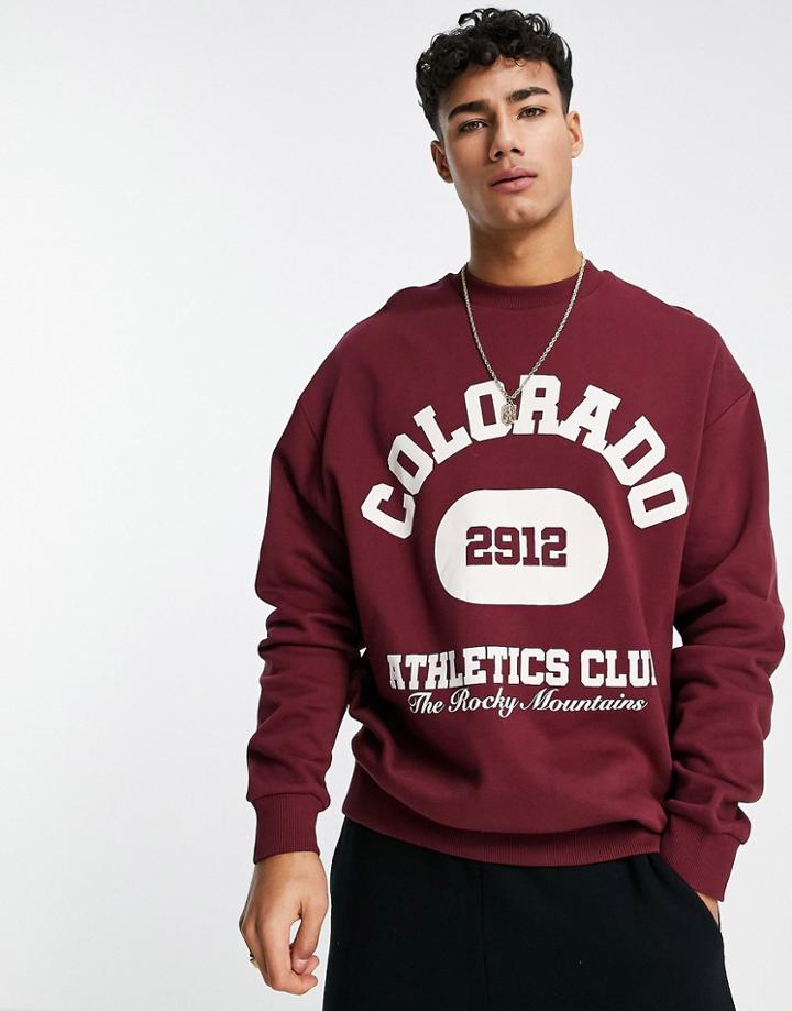 Asos Design Oversized Sweatshirt In Burgundy With Colorado City Print-red