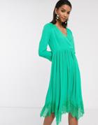 Liquorish Wrap Dress With Pleated Skirt And Lace Hem In Green