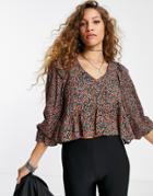 Topshop Floral Print Textured V Neck Peplum Swing Top In Multi