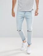 Stradivarius Slim Jeans With Knee Rips In Light Wash - Blue