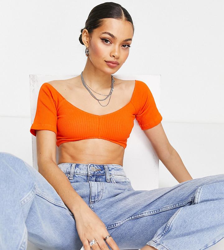 Asos Design Petite Off Shoulder Top With Shaped Hem In Rib In Orange