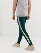 Asos Design Super Skinny Sweatpants With Side Stripe In Dark Green - Green