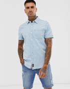 Hollister Icon Logo Pocket Short Sleeve Slim Fit Denim Shirt In Mid Wash