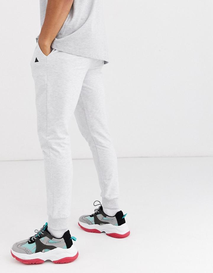 Asos Design Super Skinny Sweatpants In White Marl With Triangle
