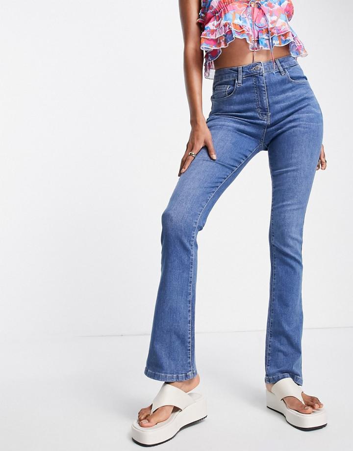 Parisian Kick Flare Jeans In Mid Blue