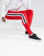 Asos Skinny Joggers In Red Poly Tricot With Side Stripe And Popper Hem - Red