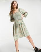 Only Mini Smock Dress With Shirring And Volume Sleeves In Green Floral Print